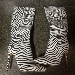 Brand new knee high Zebra Heeled boots